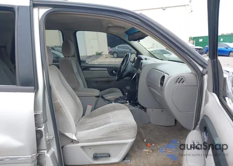 2006 GMC Envoy Sle z USA, uszkodzony, nr VIN 1GKDS13S262230137